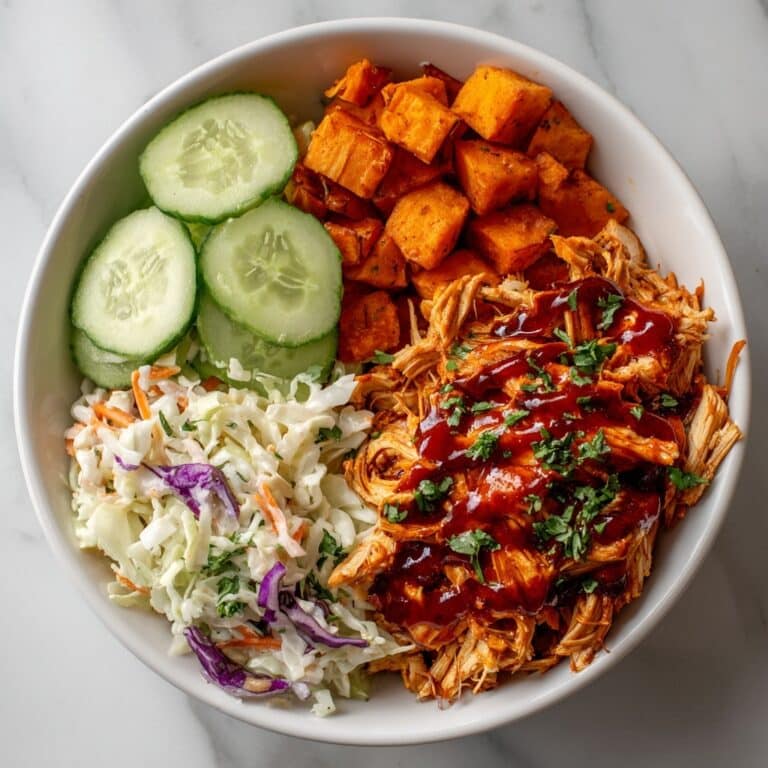 BBQ Chicken Bowls with Roasted Sweet Potatoes, Crunchy Coleslaw, and Pickles Recipe